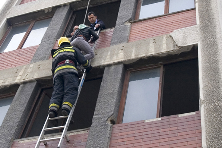 Fireman saving girl on the window